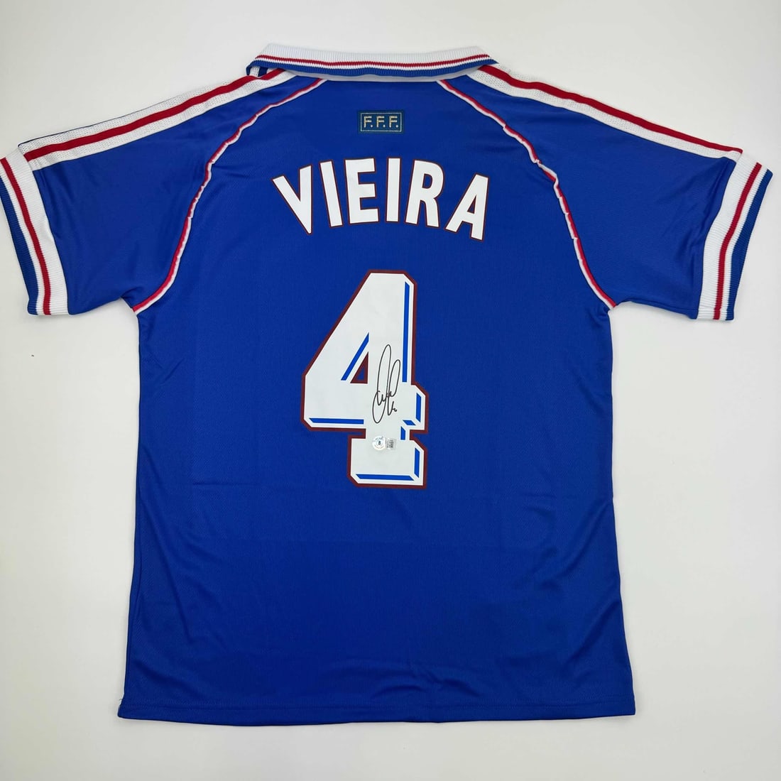Patrick Vieira Autographed France National Team Jersey BAS COA: Patrick Vieira Autographed France National Team Jersey BAS COA Celebrate the legacy of Patrick Vieira with this autographed France National Team blue jersey, featuring his name and number. This custom