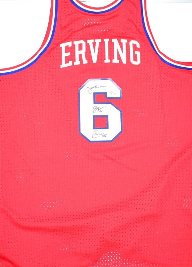 Julius Erving Autographed Philadelphia 76ers Jersey Beckett Authenticated: Julius Erving Autographed Philadelphia 76ers Jersey Beckett Authenticated This is a pre-owned red hardwood jersey by Mitchell & Ness, featuring the iconic signature of basketball legend Julius Erving.