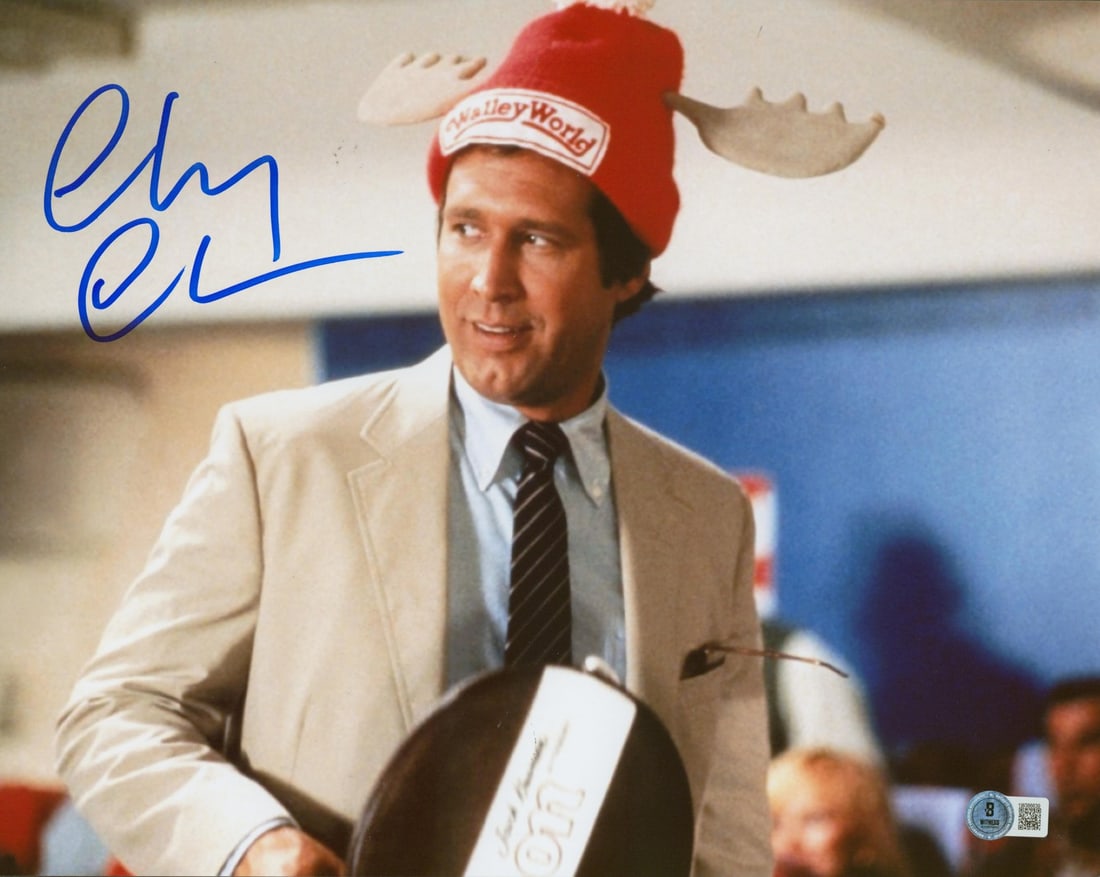 Chevy Chase Signed 11x14 Moose Hat Photo National Lampoon Christmas Vacation BAS Authenticated: Chevy Chase Signed 11x14 Moose Hat Photo National Lampoon Christmas Vacation BAS Authenticated This is an 11x14 horizontal photograph featuring Chevy Chase in the iconic moose hat from National Lampoo