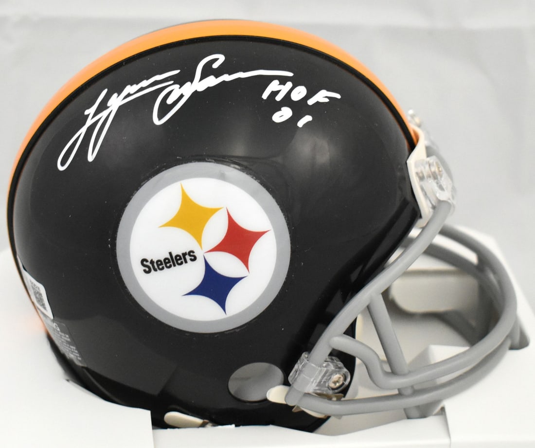 Pittsburgh Steelers Mini Helmet Signed by Lynn Swann with Beckett Authentication: Pittsburgh Steelers Mini Helmet Signed by Lynn Swann with Beckett Authentication This Pittsburgh Steelers mini helmet is autographed by Lynn Swann and features a Hall of Fame inscription. The signatur