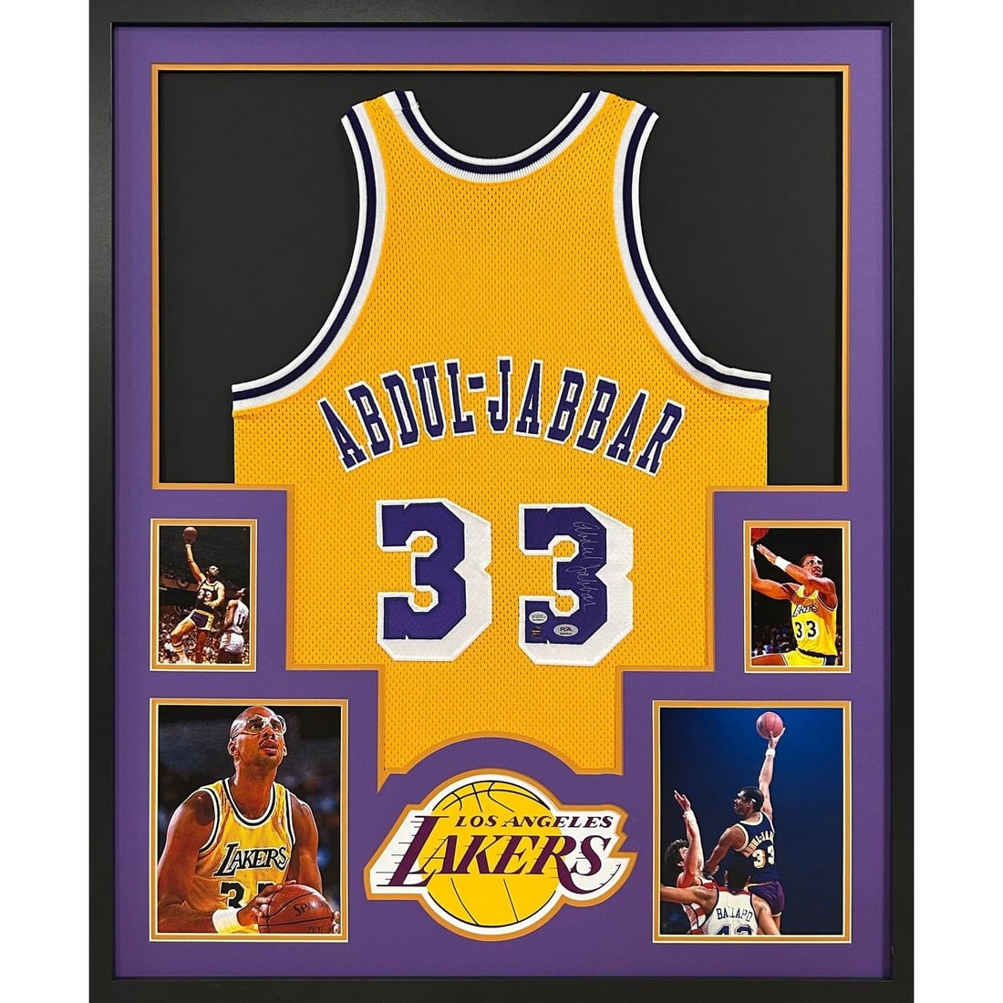 Kareem Abdul-Jabbar Signed Framed Jersey PSA/DNA Lakers 42x34: Kareem Abdul-Jabbar Signed Framed Jersey PSA/DNA Lakers 42x34 This is an autographed framed jersey of Kareem Abdul-Jabbar, featuring the iconic Lakers logo. The jersey is authenticated by PSA/DNA, a l
