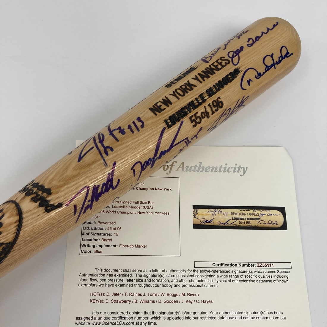 1996 Yankees Team Signed Bat with Jeter and JSA COA: 1996 Yankees Team Signed Bat with Jeter and JSA COA Celebrate the legacy of the 1996 New York Yankees with this limited-edition Louisville Slugger commemorative bat. Measuring 33 inches, this bat is b