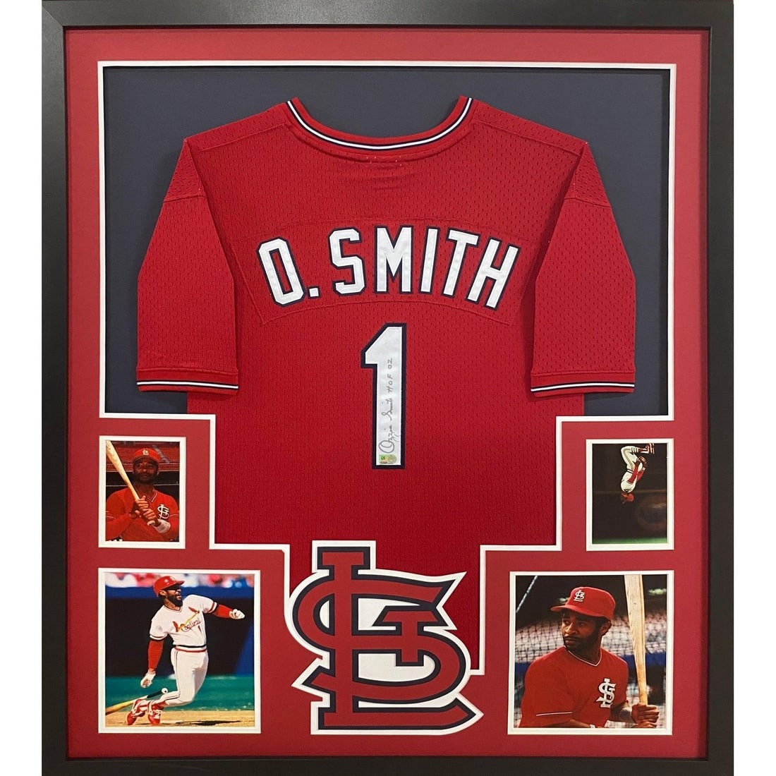 Ozzie Smith Autographed Framed Jersey with MLB COA 42x34: Ozzie Smith Autographed Framed Jersey with MLB COA 42x34 Celebrate a piece of baseball history with this autographed Ozzie Smith framed jersey. This item features a meticulously detailed framing and