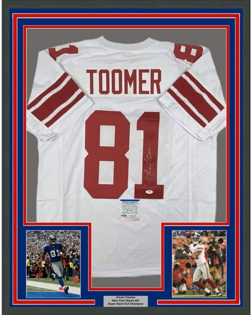 Framed Amani Toomer Autographed Jersey New York Giants PSA/DNA COA: Framed Amani Toomer Autographed Jersey New York Giants PSA/DNA COA This stunning framed jersey features the autograph of Amani Toomer, a celebrated player of the New York Giants. The jersey is profess