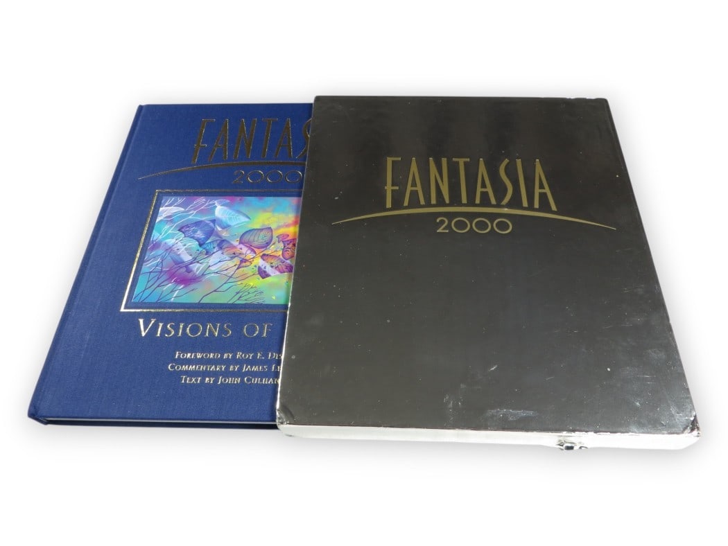 Roy E Disney Signed Fantasia 2000 Hardcover Book JSA Authenticated: Roy E Disney Signed Fantasia 2000 Hardcover Book JSA Authenticated This collectible hardcover book features the signature of Roy E. Disney, adding a personal touch to the beloved Fantasia 2000. Authen