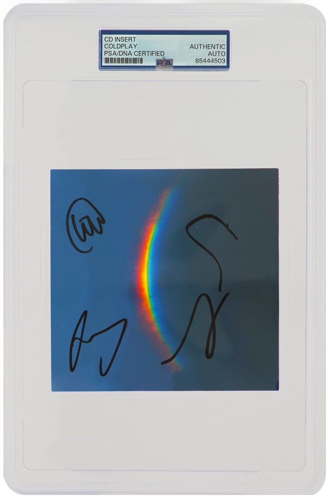 Coldplay Signed Moon Music CD Insert Card PSA/DNA Authenticated 4 Signatures: Coldplay Signed Moon Music CD Insert Card PSA/DNA Authenticated 4 Signatures This Coldplay band signed 'Moon Music' CD insert card is a unique collectible for any fan. Measuring 5x5 inches, this inser