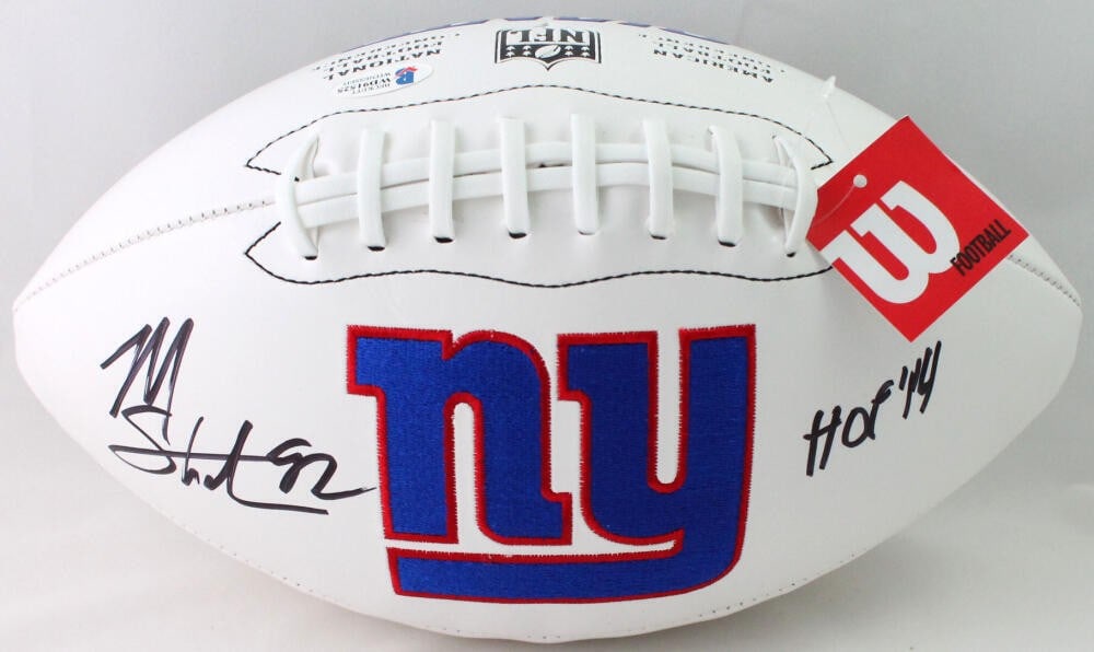 Michael Strahan Signed Giants Football with Beckett Authentication: Michael Strahan Signed Giants Football with Beckett Authentication This is an original New York Giants logo football signed by NFL legend Michael Strahan, who is renowned for his exceptional career wi