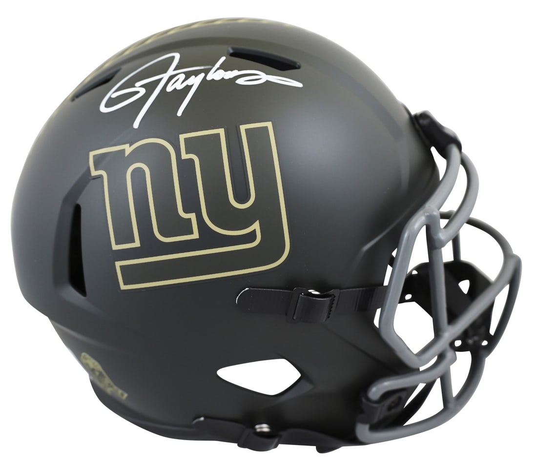 Lawrence Taylor Signed Giants Salute to Service IV Helmet BAS Authenticated: Lawrence Taylor Signed Giants Salute to Service IV Helmet BAS Authenticated This authentic full-size speed replica helmet features the iconic design of the New York Giants and has been personally sign