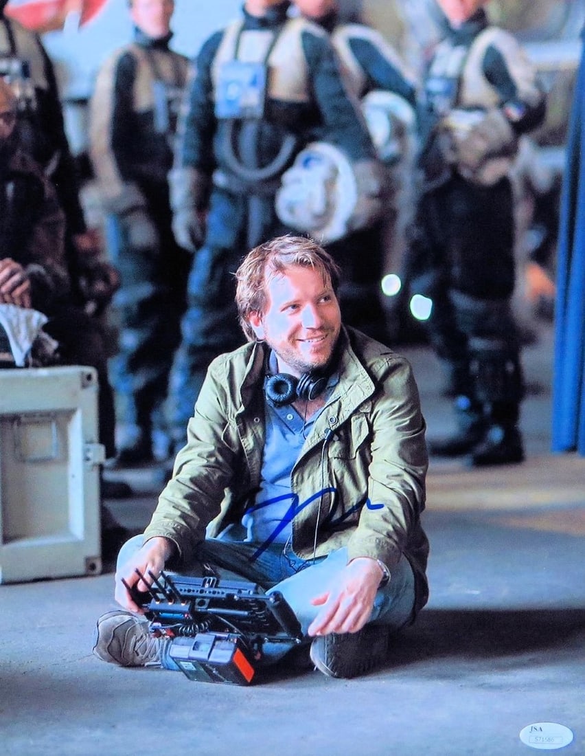 Gareth Edwards Signed 11X14 Photo Star Wars Rogue One JSA Certified: Gareth Edwards Signed 11X14 Photo Star Wars Rogue One JSA Certified This is an authentic 11x14 photograph signed by Gareth Edwards, the acclaimed director of Star Wars: Rogue One. The autograph is aut