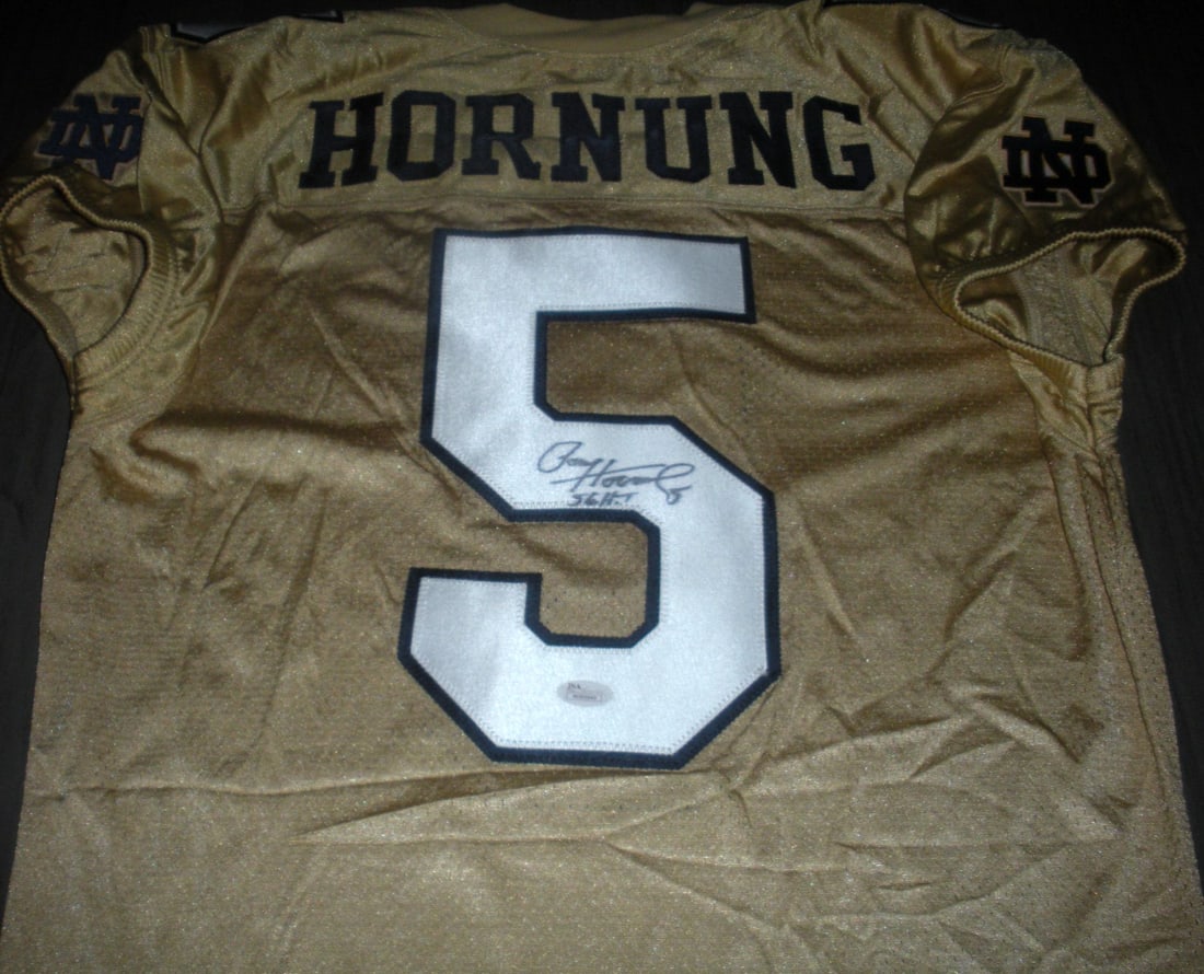 Paul Hornung Signed Notre Dame Under Armour Jersey with JSA COA: Paul Hornung Signed Notre Dame Under Armour Jersey with JSA COA Showcase your love for football with this officially licensed Under Armour jersey signed by Paul Hornung, a notable Notre Dame alumnus.