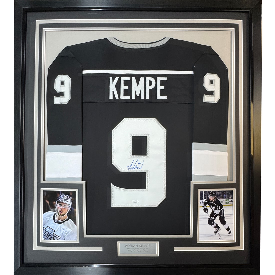 Framed Adrian Kempe Autographed Black Jersey Los Angeles Kings JSA COA 35x39: Framed Adrian Kempe Autographed Black Jersey Los Angeles Kings JSA COA 35x39 Showcase your love for the game with this framed autographed Adrian Kempe jersey from the Los Angeles Kings. This authentic