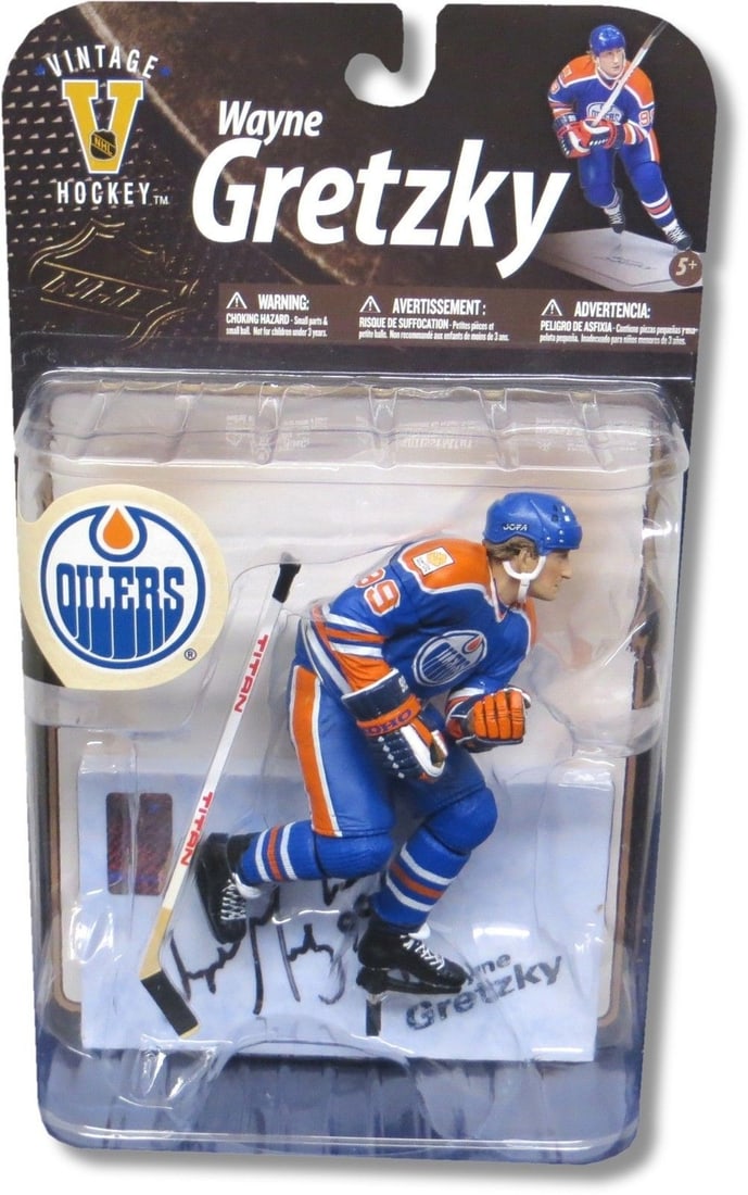 Wayne Gretzky Autographed Oilers Vintage McFarlane Figure WGA Authenticated: Wayne Gretzky Autographed Oilers Vintage McFarlane Figure WGA Authenticated This Wayne Gretzky autographed McFarlane figure captures the legendary player in his Edmonton Oilers blue road jersey. The u