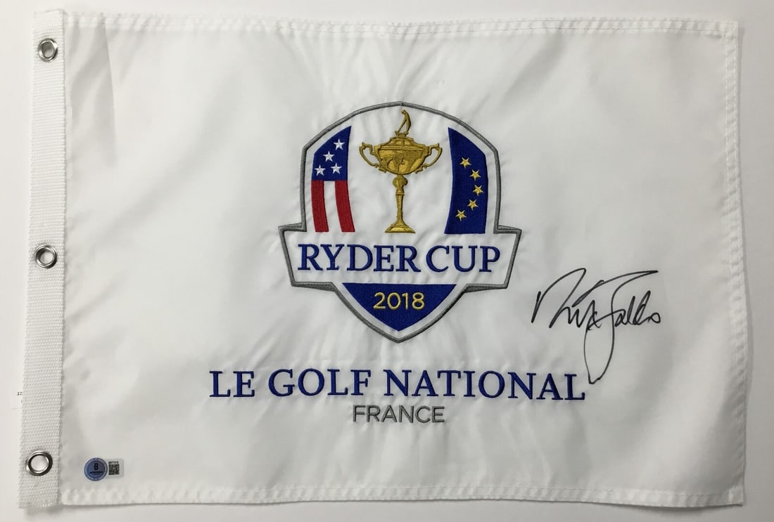 Nick Faldo Signed 2018 Ryder Cup Flag Beckett Authenticated: Nick Faldo Signed 2018 Ryder Cup Flag Beckett Authenticated Celebrate the legacy of golf with this official 2018 Ryder Cup Le Golf National pin flag, beautifully signed by PGA legend Nick Faldo. This