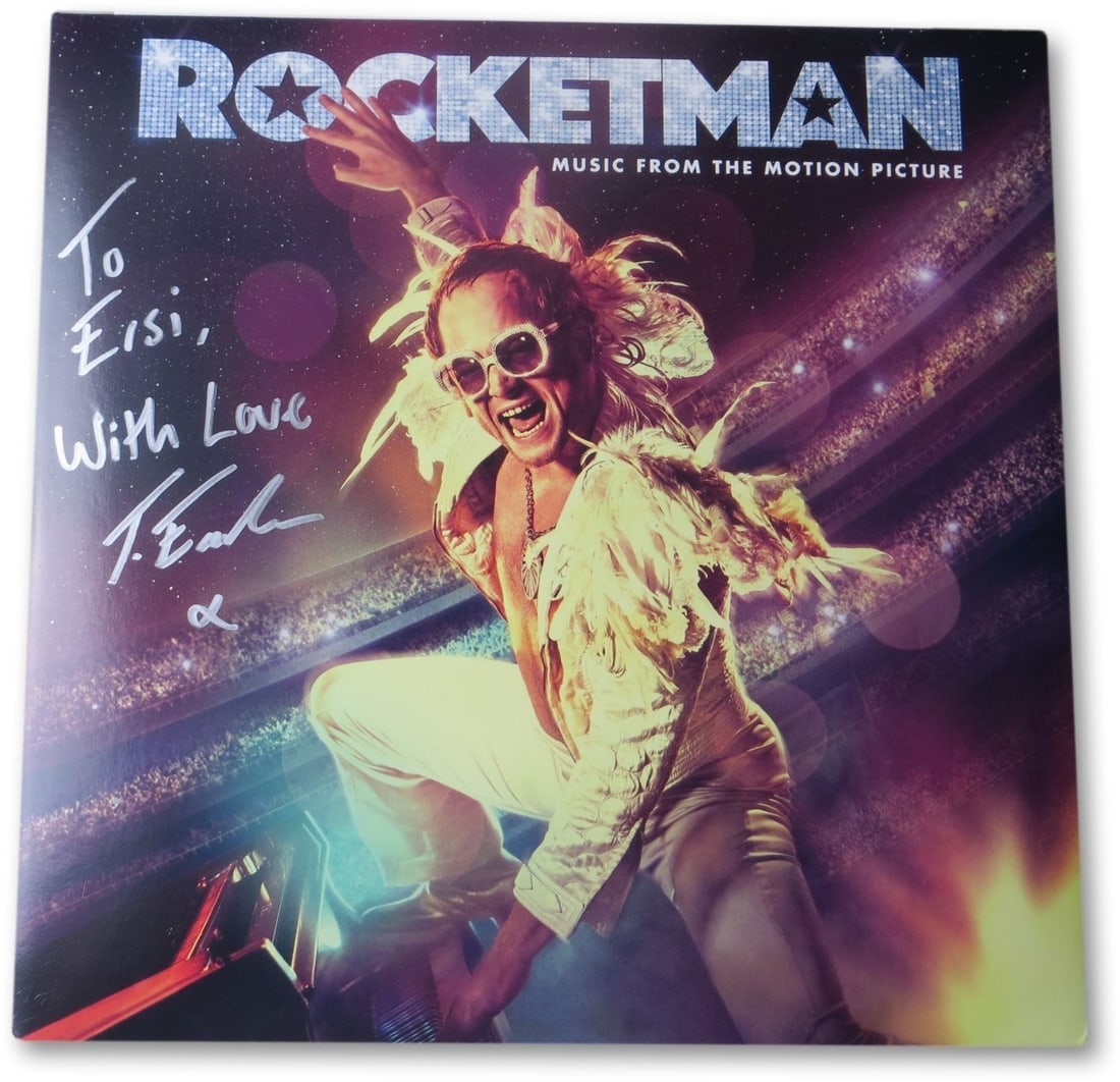 Taron Egerton Signed Rocketman Album Cover JSA Authenticated: Taron Egerton Signed Rocketman Album Cover JSA Authenticated This Taron Egerton signed autographed record album cover from the film 'Rocketman' features the signature of the acclaimed actor himself. T