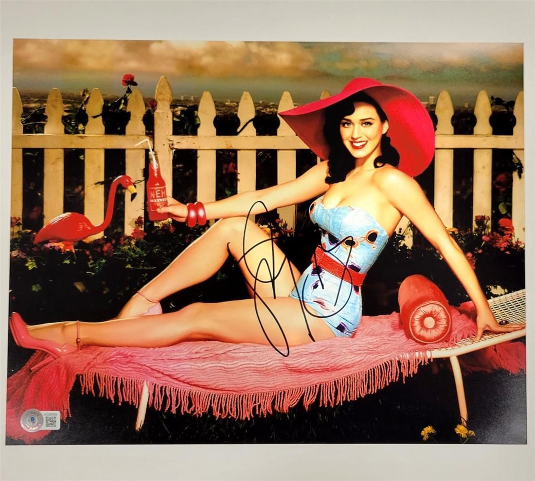 11x14 Katy Perry One of the Boys Signed Photo Beckett Authenticated: 11x14 Katy Perry One of the Boys Signed Photo Beckett Authenticated This original 11x14 photograph features the autograph of Katy Perry from the United States. The signature has been authenticated by
