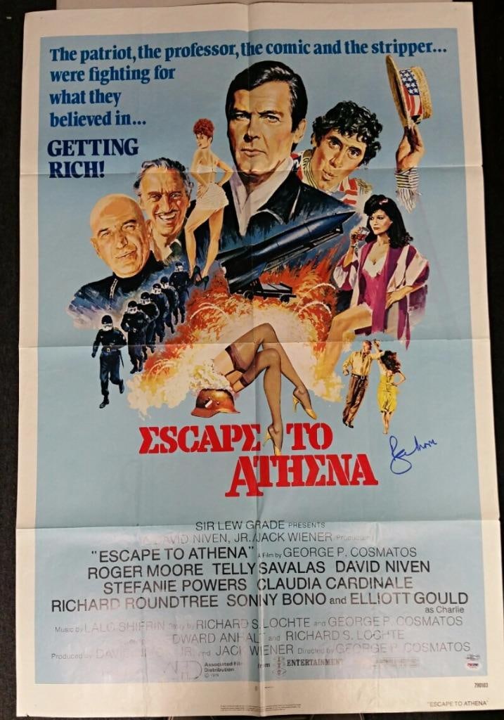 Escape to Athena 1979 Movie Poster Signed by Roger Moore 28x40 With PSA DNA COA: Escape to Athena 1979 Movie Poster Signed by Roger Moore 28x40 With PSA DNA COA This is an original 1979 movie poster for 'Escape To Athena' signed by Roger Moore. The poster measures 28x40 inches and