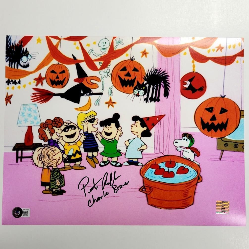 Peter Robbins Signed Charlie Brown Halloween Photo 11x14 Beckett Authenticated: Peter Robbins Signed Charlie Brown Halloween Photo 11x14 Beckett Authenticated This is an original 11x14 photo featuring Peter Robbins as Charlie Brown, signed by the actor himself. The signature has
