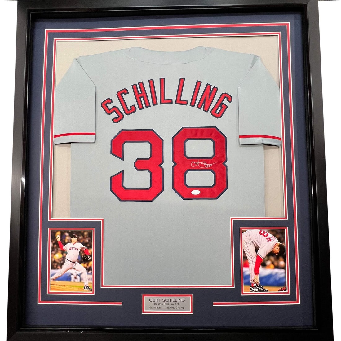 Framed Autographed Curt Schilling Boston Red Sox Jersey JSA COA: Framed Autographed Curt Schilling Boston Red Sox Jersey JSA COA This professionally framed and matted piece features a Boston Red Sox jersey autographed by Curt Schilling. Measuring 33"x42", the displ