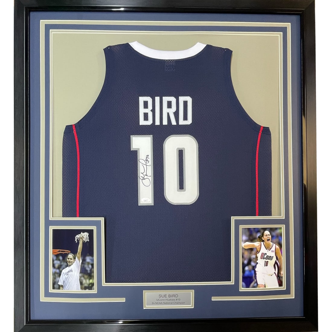 Framed Signed Sue Bird UConn Jersey with JSA Authentication: Framed Signed Sue Bird UConn Jersey with JSA Authentication Celebrate the legacy of Sue Bird with this professionally framed and autographed UConn Blue College Jersey. Measuring 35 inches by 39 inches