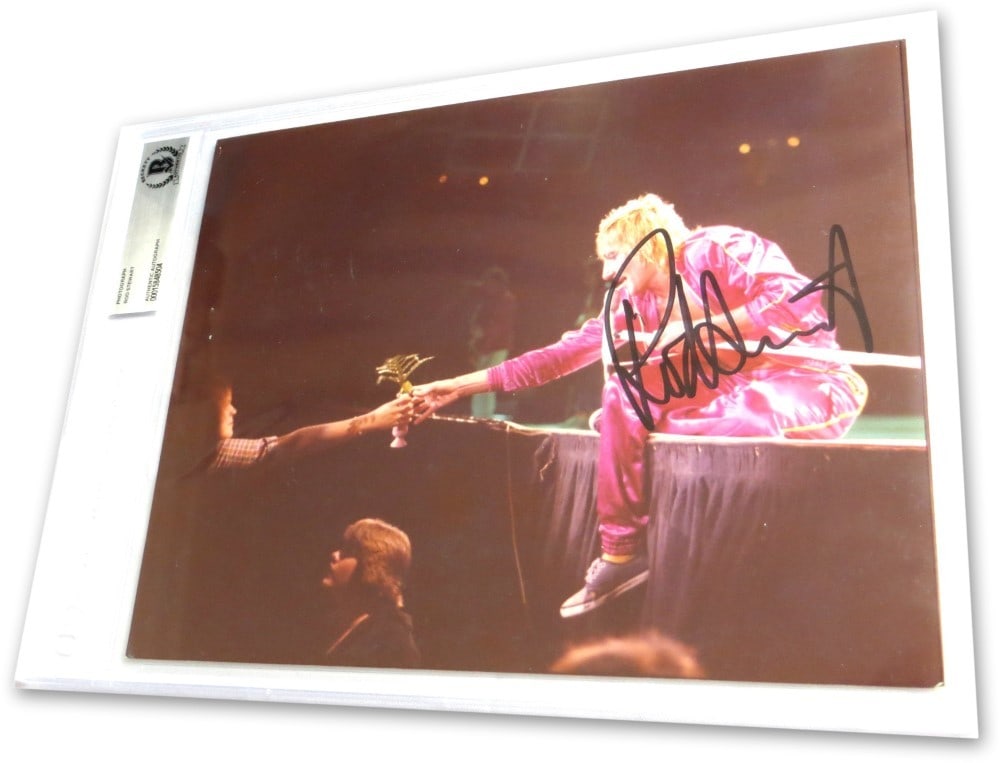 Rod Stewart Autographed 8x10 Photo with Beckett Authentication: Rod Stewart Autographed 8x10 Photo with Beckett Authentication This is an original, autographed 8X10 photograph of Rod Stewart singing on stage, authenticated by Beckett Authentication Services (BAS).