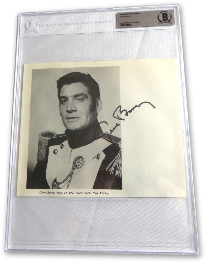 Gene Barry Autographed War of the Worlds Photo Beckett Authenticated 8.75x12: Gene Barry Autographed War of the Worlds Photo Beckett Authenticated 8.75x12 This is an original, autographed magazine photo of Gene Barry from the classic film "War of the Worlds." The photograph is