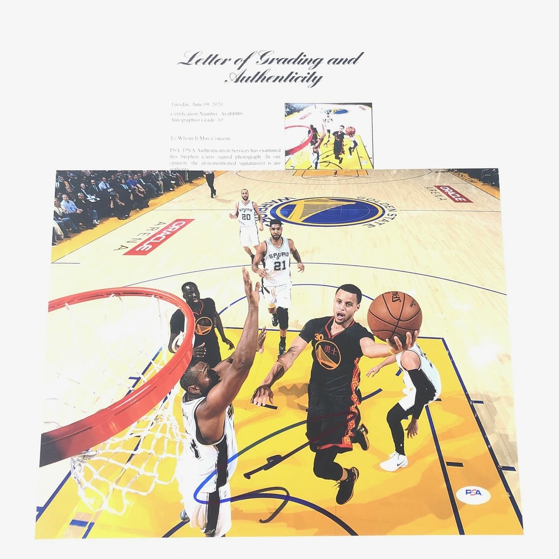 Stephen Curry Signed 11x14 Photo PSA/DNA Grade 10 Authentic: Stephen Curry Signed 11x14 Photo PSA/DNA Grade 10 Authentic This 11x14 photo captures the dynamic talent of NBA superstar Stephen Curry, a key player for the Golden State Warriors. The autograph has b