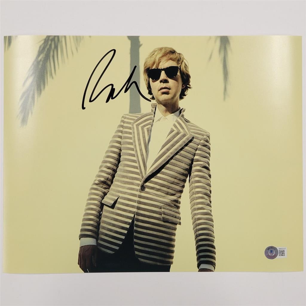 Autographed 11x14 Photo of Beck with Beckett Authentication: Autographed 11x14 Photo of Beck with Beckett Authentication This is an original 11x14 photograph signed by singer and musician Beck Hansen. The autograph has been authenticated by Beckett and comes wi
