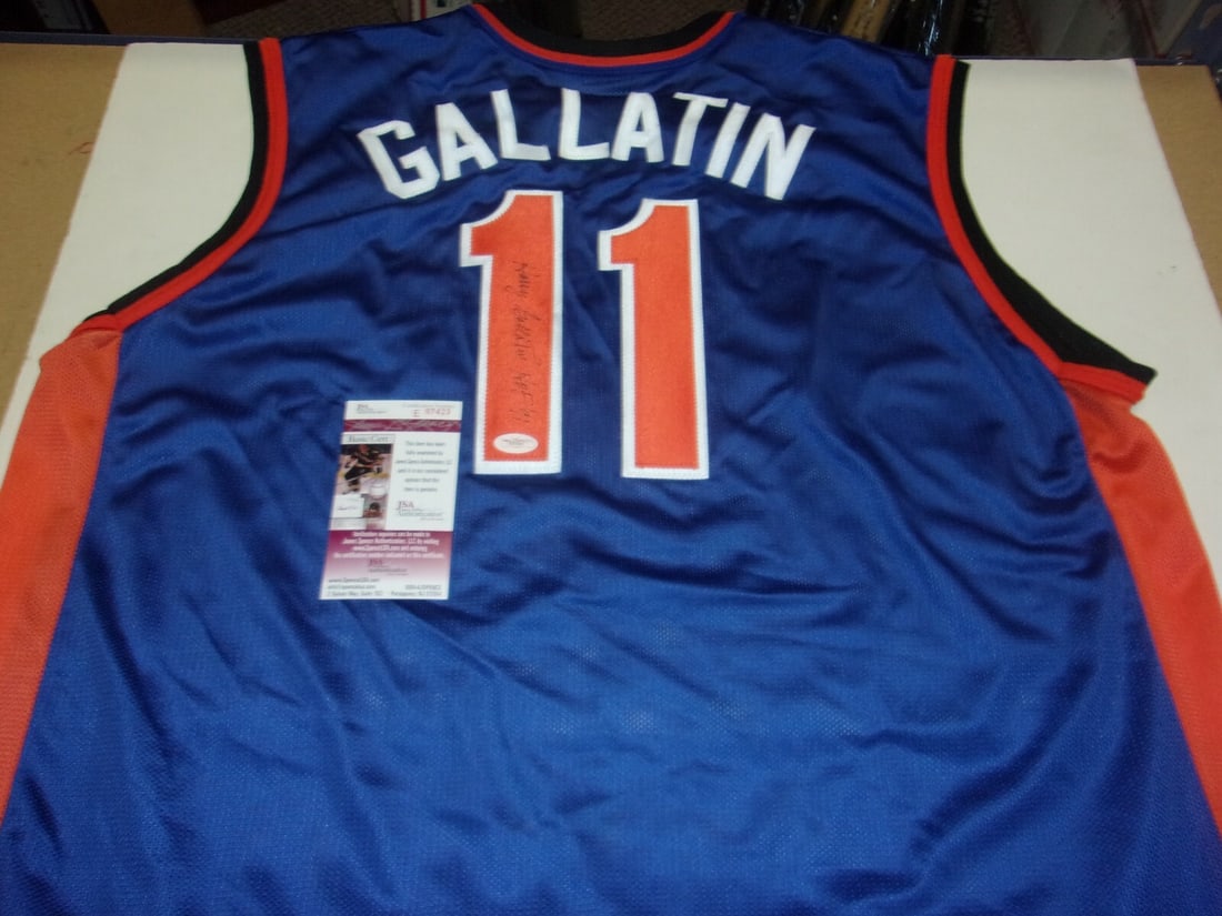 Harry Gallatin New York Knicks Signed Champion Jersey JSA COA: Harry Gallatin New York Knicks Signed Champion Jersey JSA COA This is an official New York Knicks champion jersey, signed by Harry Gallatin, a notable player in the NBA. The jersey is in pre-owned con