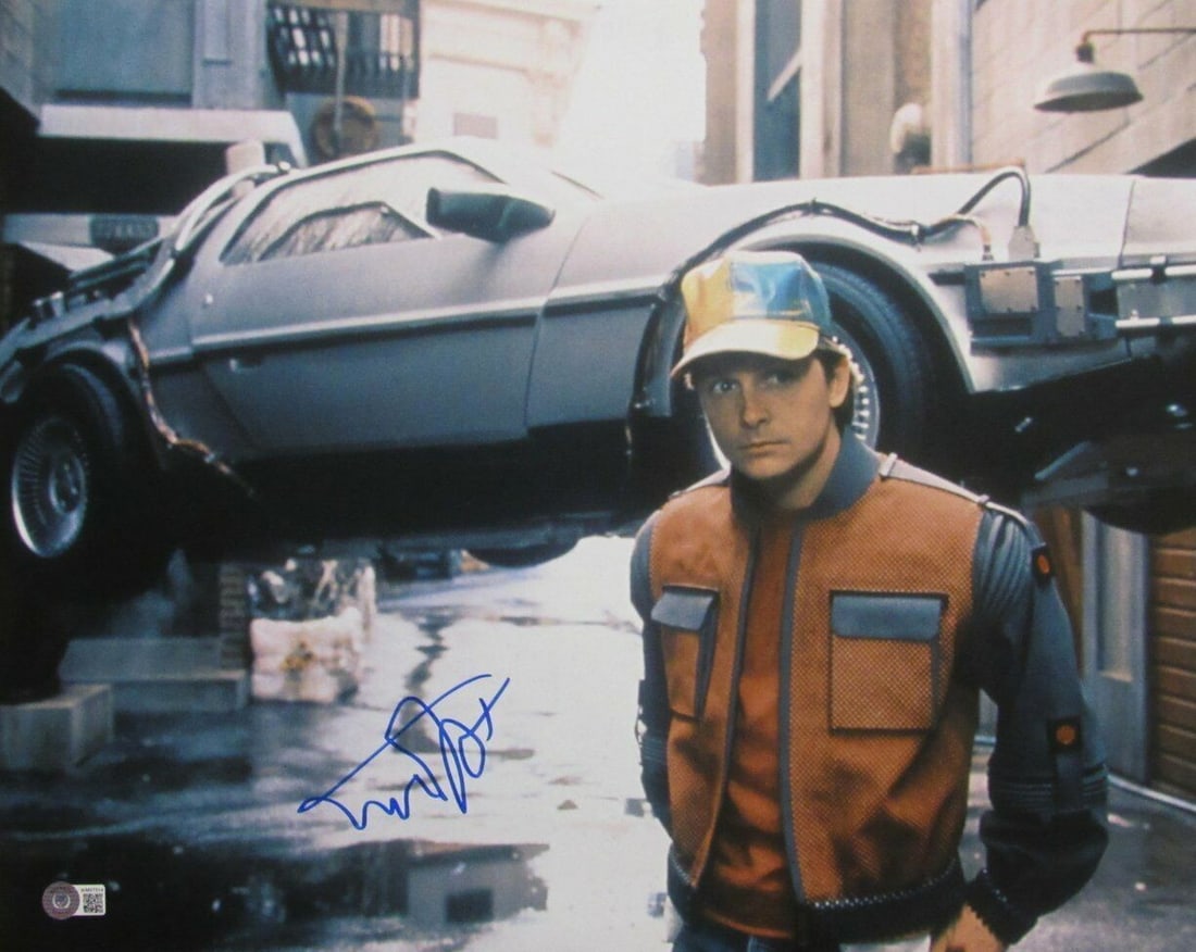 Michael J Fox Signed Back to the Future II 16x20 Photo BAS Authenticated: Michael J Fox Signed Back to the Future II 16x20 Photo BAS Authenticated This is a stunning 16x20 photo of Michael J. Fox from "Back to the Future II," hand-signed by the actor himself. The autograph