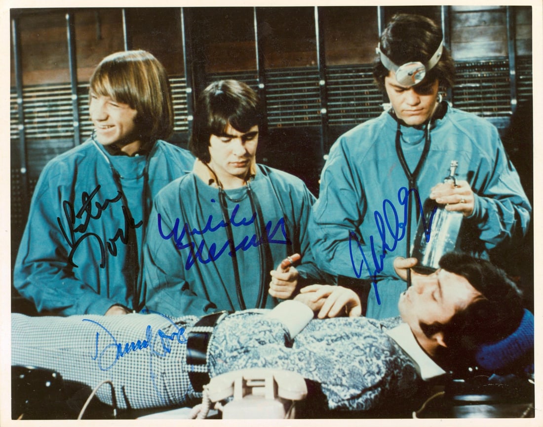 The Monkees Signed 8x10 Photo with PSA/DNA Authentication: The Monkees Signed 8x10 Photo with PSA/DNA Authentication This iconic 8x10 photograph features the legendary members of The Monkees: Peter Tork, Micky Dolenz, Michael Nesmith, and Davy Jones. Each mem