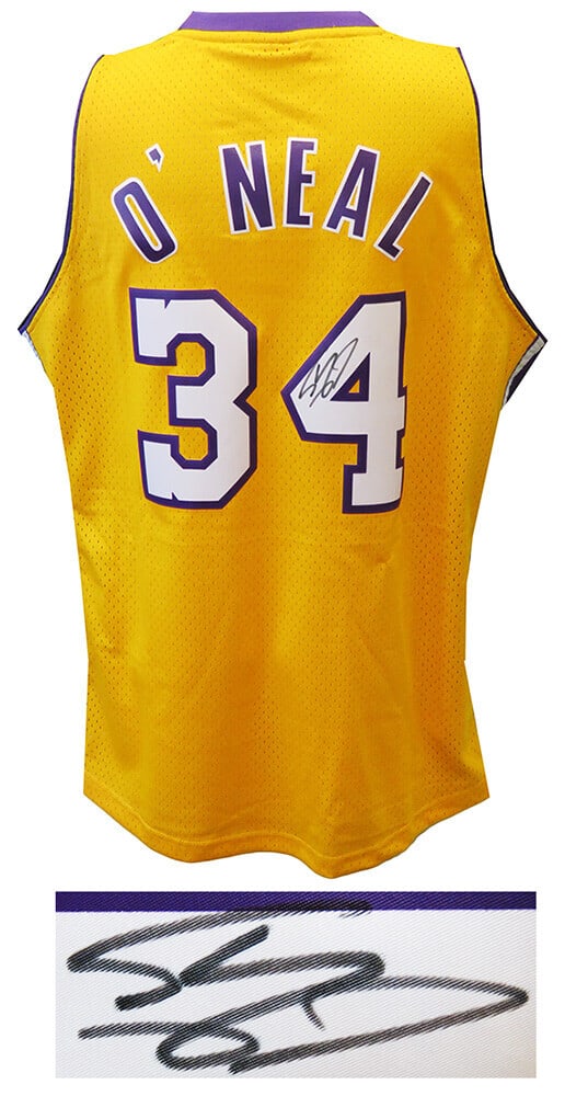 Shaquille O'Neal Signed Lakers Gold NBA Jersey with COA: Shaquille O'Neal Signed Lakers Gold NBA Jersey with COA This is a pre-owned, original Los Angeles Lakers Mitchell & Ness gold NBA Swingman basketball jersey signed by basketball legend Shaquille O'Nea