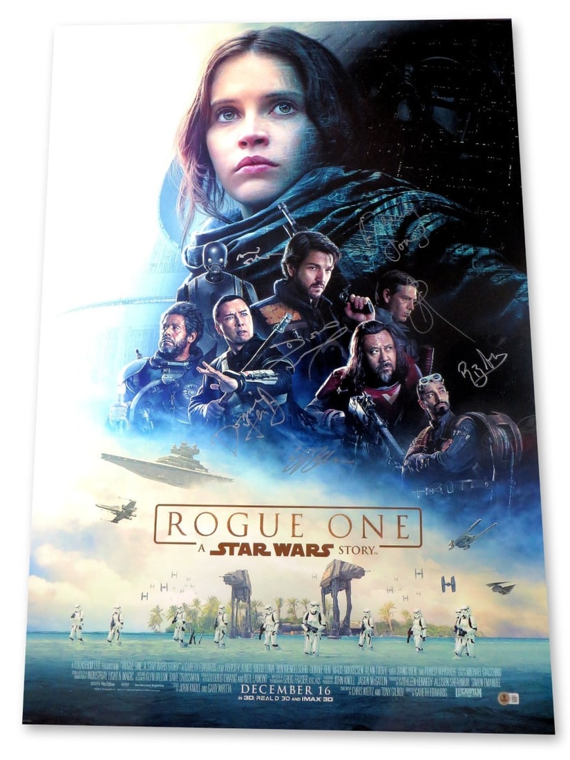 Rogue One 27X40 Autographed Poster by Jones Luna Tudyk +4 Beckett Authenticated: Rogue One 27X40 Autographed Poster by Jones Luna Tudyk +4 Beckett Authenticated Celebrate the epic saga of Rogue One with this stunning autographed 27" x 40" poster. This original poster is signed by
