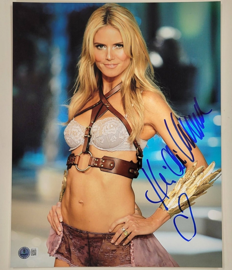Heidi Klum Signed 11x14 Victoria's Secret Photo Beckett Authenticated: Heidi Klum Signed 11x14 Victoria's Secret Photo Beckett Authenticated This stunning 11x14 photograph features the iconic Heidi Klum, renowned Victoria's Secret model, showcasing her signature in a bol