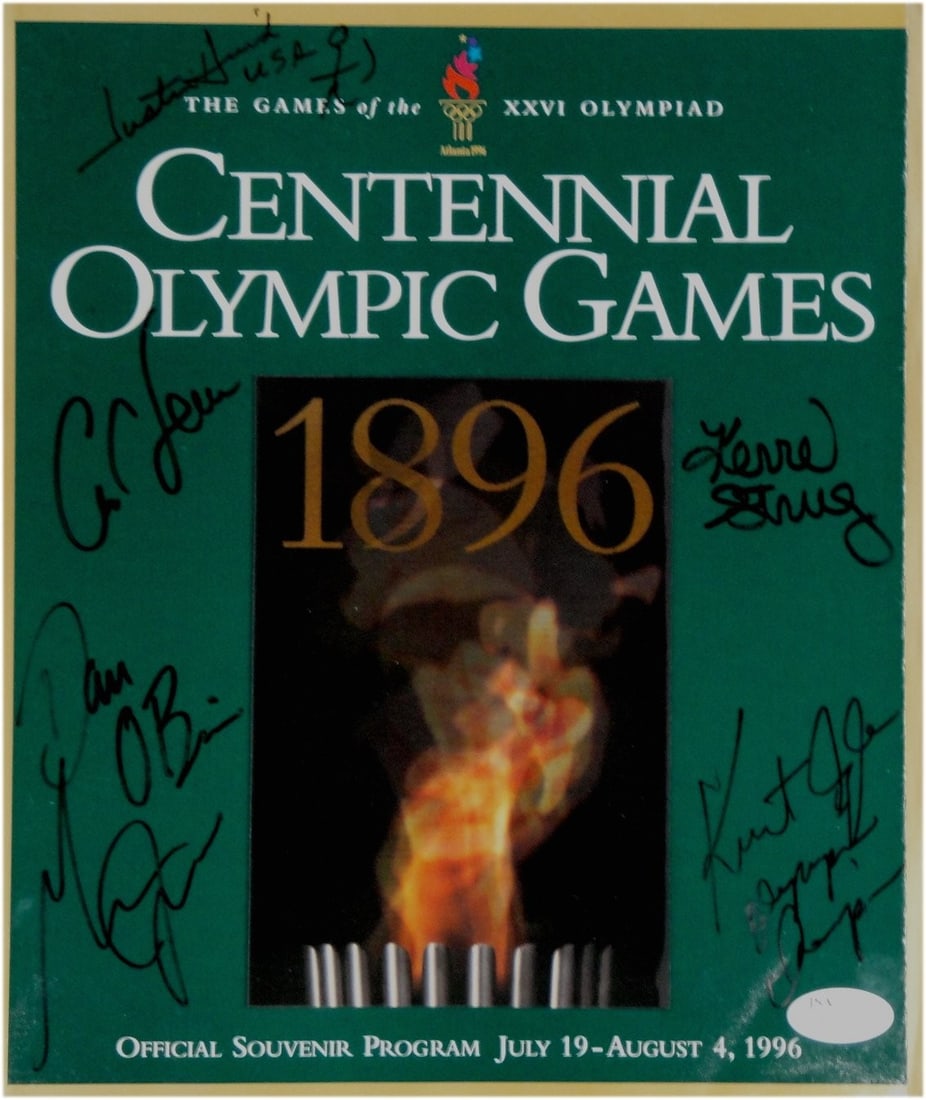 Signed Olympic Magazine with Carl Lewis Kerri Strug Kurt Angle JSA Authenticated: Signed Olympic Magazine with Carl Lewis Kerri Strug Kurt Angle JSA Authenticated This autographed magazine features the signatures of Olympic legends Carl Lewis, Kerri Strug, Kurt Angle, Michael Johns