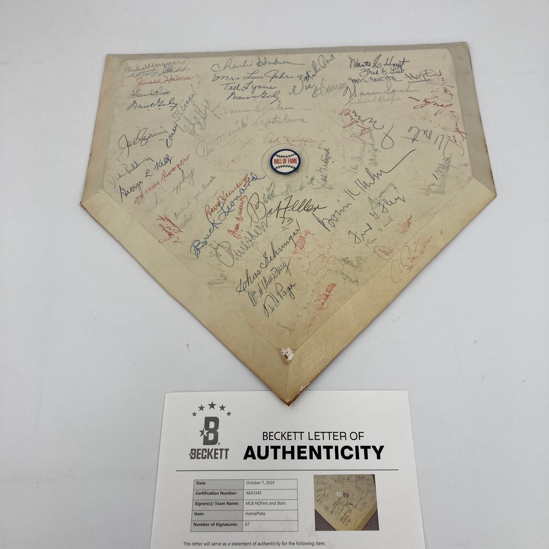 1970s Hall of Fame Signed Home Plate with 67 Autographs Beckett Certified: 1970s Hall of Fame Signed Home Plate with 67 Autographs Beckett Certified This is an original 1970s Hall of Fame induction home plate, multi-signed by 67 notable baseball figures. Signatures include l