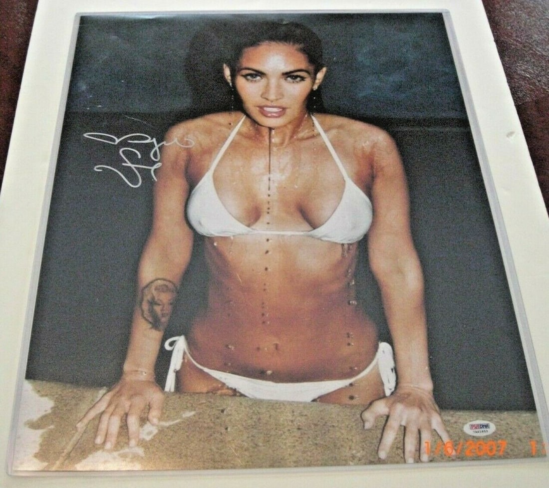 Megan Fox Signed 16x20 Bikini Photo with PSA/DNA Certification: Megan Fox Signed 16x20 Bikini Photo with PSA/DNA Certification This is an original 16x20 photograph of Megan Fox, known for her role as a model and actress in the Transformers films. The photo is PSA/