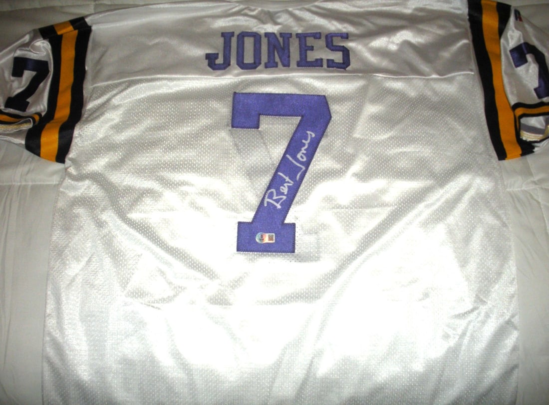 Bert Jones Signed LSU Tigers Colts Russell Jersey with COA: Bert Jones Signed LSU Tigers Colts Russell Jersey with COA This official licensed Russell jersey is signed by Bert Jones, a celebrated player from the LSU Tigers and Indianapolis Colts. It is an origi