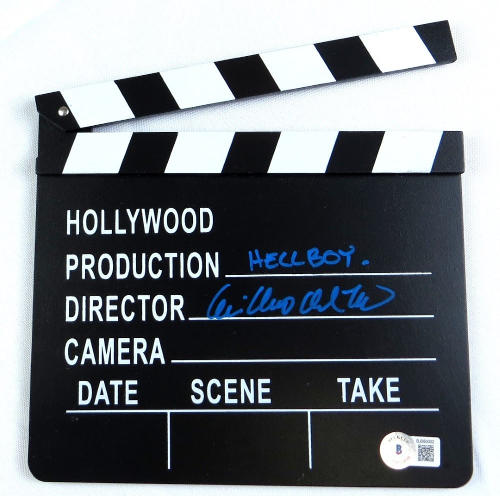 Guillermo del Toro Signed Mini Movie Clapper Hellboy Beckett Authenticated: Guillermo del Toro Signed Mini Movie Clapper Hellboy Beckett Authenticated This is a mini movie clapper signed by acclaimed director Guillermo del Toro, known for his work on films such as Hellboy. Th