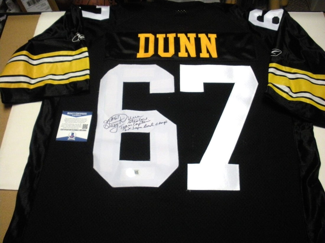 Gary Dunn Signed Pittsburgh Steelers Reebok Jersey with COA: Gary Dunn Signed Pittsburgh Steelers Reebok Jersey with COA This officially licensed Reebok jersey is a must-have for any Pittsburgh Steelers fan. Signed by Gary Dunn, this original jersey showcases y