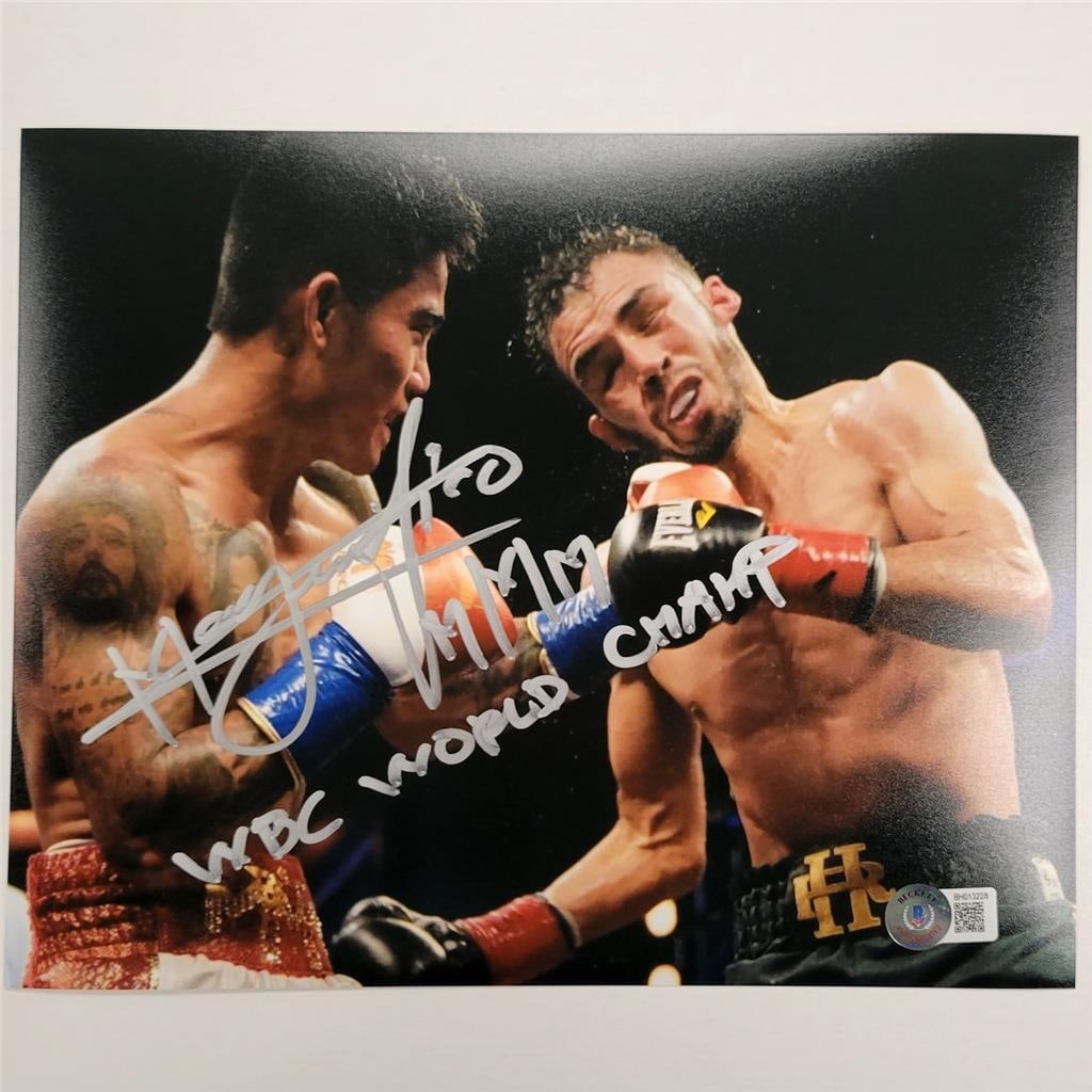 Autographed 8x10 Boxing Photo Mark Magsayo WBC World Champ Beckett BAS Holo: Autographed 8x10 Boxing Photo Mark Magsayo WBC World Champ Beckett BAS Holo This is an original 8x10 photograph signed by Mark Magsayo, featuring the inscription "WBC World Champ." The photo is authen
