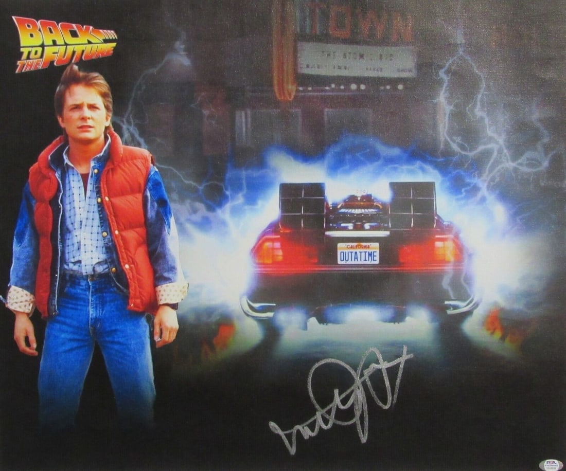 Michael J Fox Signed Back to the Future Canvas 22x26 PSA/DNA: Michael J Fox Signed Back to the Future Canvas 22x26 PSA/DNA Celebrate the iconic film "Back to the Future" with this impressive 22x26 canvas print signed by Michael J. Fox. This artwork is an origina