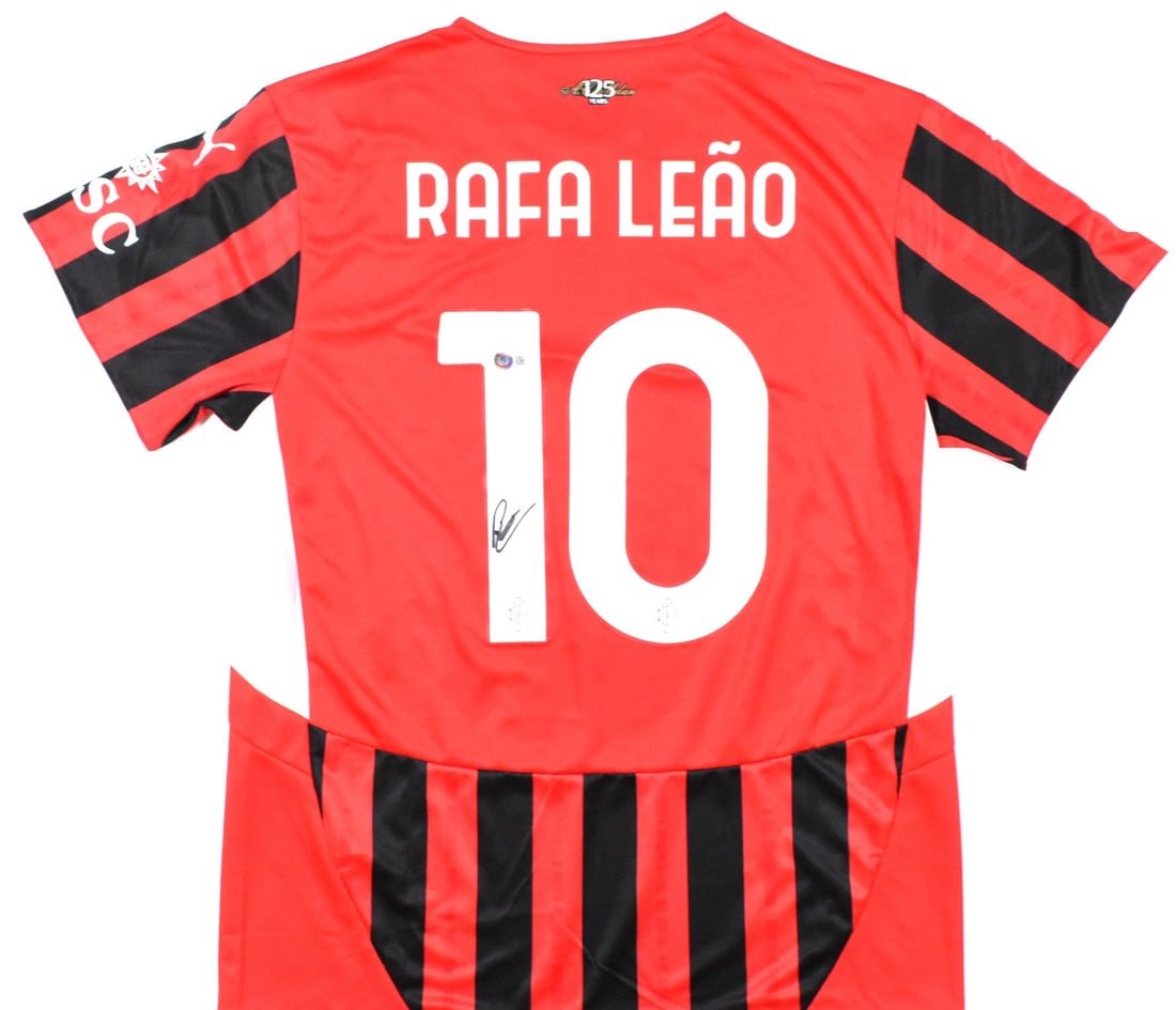 Rafael Leao #10 Signed AC Milan Home Jersey Beckett Hologram: Rafael Leao #10 Signed AC Milan Home Jersey Beckett Hologram This authentic AC Milan home soccer jersey is signed by the talented player Rafael Leao, wearing number 10. The jersey is an original piece