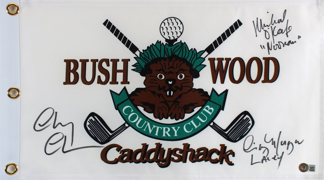 Caddyshack Bushwood Flag Signed by Chase Morgan O'Keefe BAS Witnessed: Caddyshack Bushwood Flag Signed by Chase Morgan O'Keefe BAS Witnessed This Bushwood Country Club flag features the authentic signatures of Chevy Chase, Cindy Morgan, and Michael O'Keefe, capturing a p