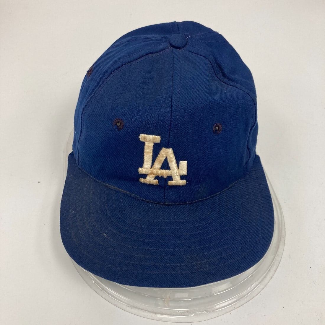 1950s Los Angeles Dodgers Game Used Baseball Cap Hat: 1950s Los Angeles Dodgers Game Used Baseball Cap Hat This vintage 1950's Los Angeles Dodgers game-used baseball cap is a unique piece of sports memorabilia. This cap is associated with the Visiting Te