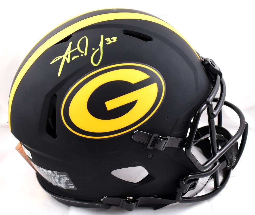 Green Bay Packers Eclipse Speed Authentic Helmet Signed by Aaron Jones Beckett Holo: Green Bay Packers Eclipse Speed Authentic Helmet Signed by Aaron Jones Beckett Holo This is an authentic Green Bay Packers full-size Eclipse Speed helmet signed by Aaron Jones. The autograph is authen