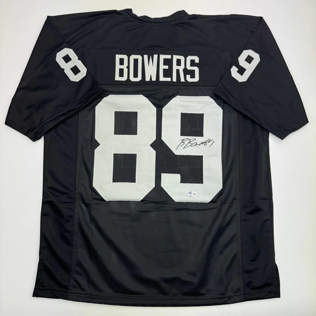 Brock Bowers Autographed Black Custom Jersey Las Vegas Raiders BAS COA: Brock Bowers Autographed Black Custom Jersey Las Vegas Raiders BAS COA This is an authentic autographed Brock Bowers Las Vegas Raiders black football jersey, featuring the player's name and number. Th