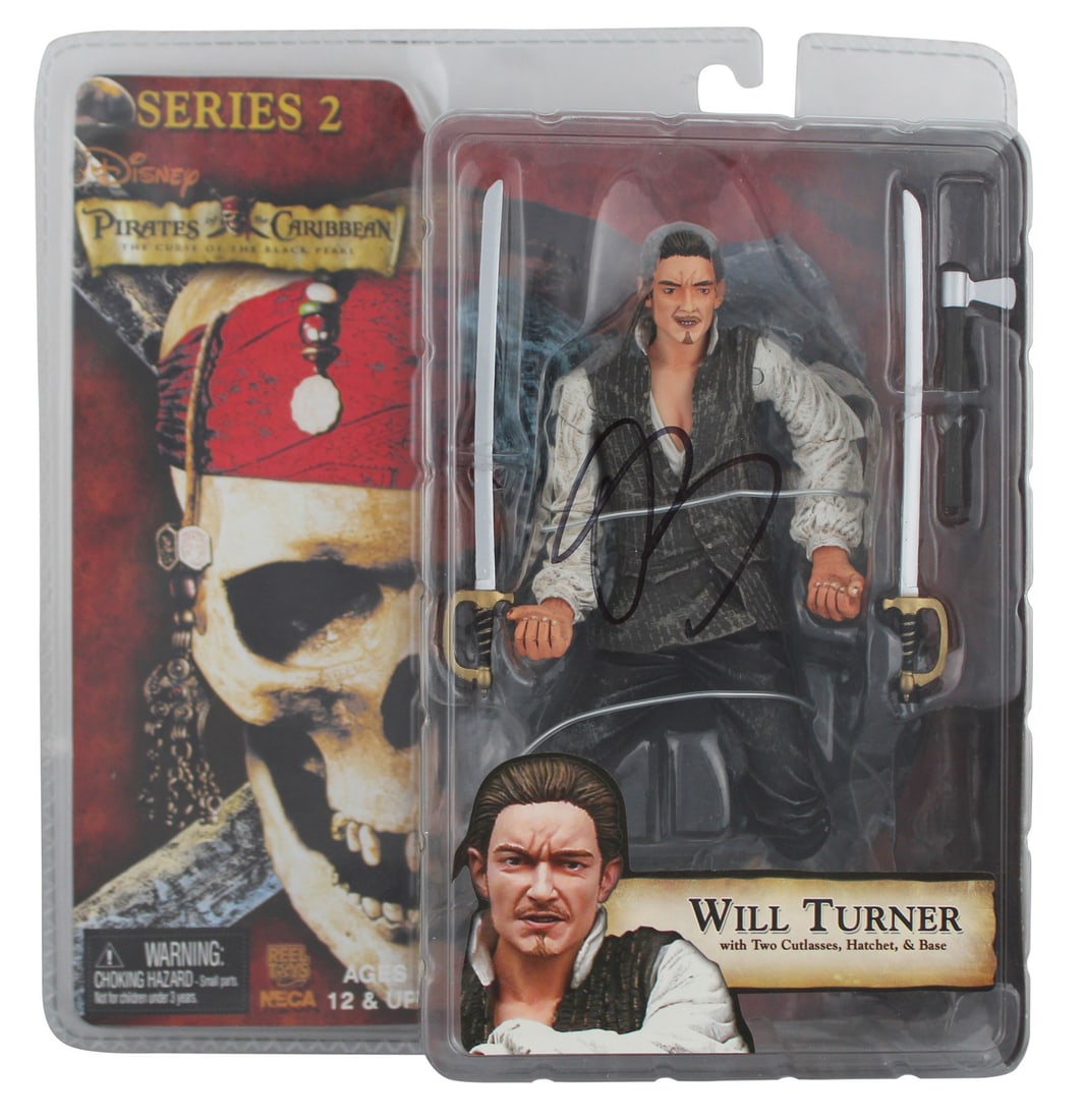 Orlando Bloom Signed Will Turner Action Figure PSA/DNA Pirates Of The Caribbean: Orlando Bloom Signed Will Turner Action Figure PSA/DNA Pirates Of The Caribbean This authentic 7-inch Will Turner action figure from the Pirates Of The Caribbean: The Curse Of The Black Pearl Series 2