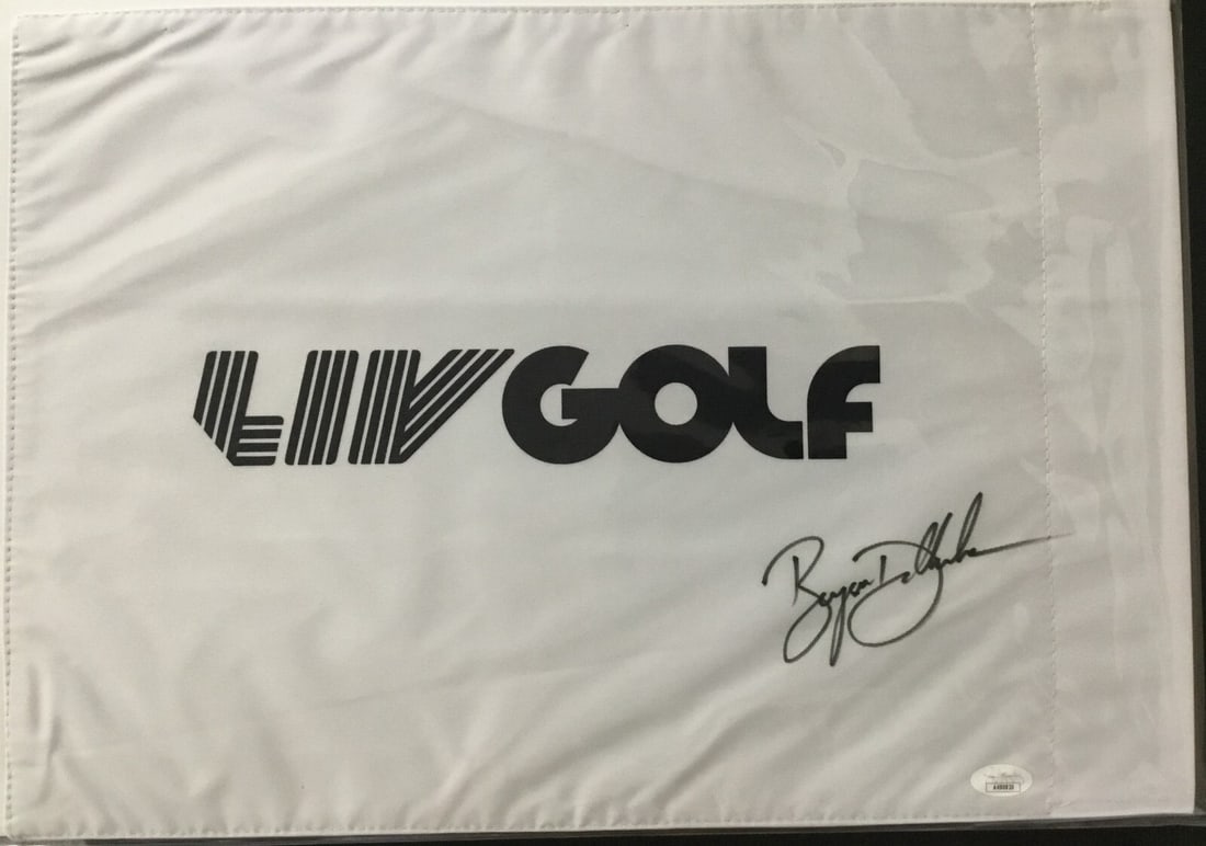 Bryson DeChambeau Signed LIV Golf Bedminster Flag JSA Authenticated: Bryson DeChambeau Signed LIV Golf Bedminster Flag JSA Authenticated Celebrate golf history with this official white LIV Golf-Trump Bedminster pin flag, signed by the renowned golfer Bryson DeChambeau.