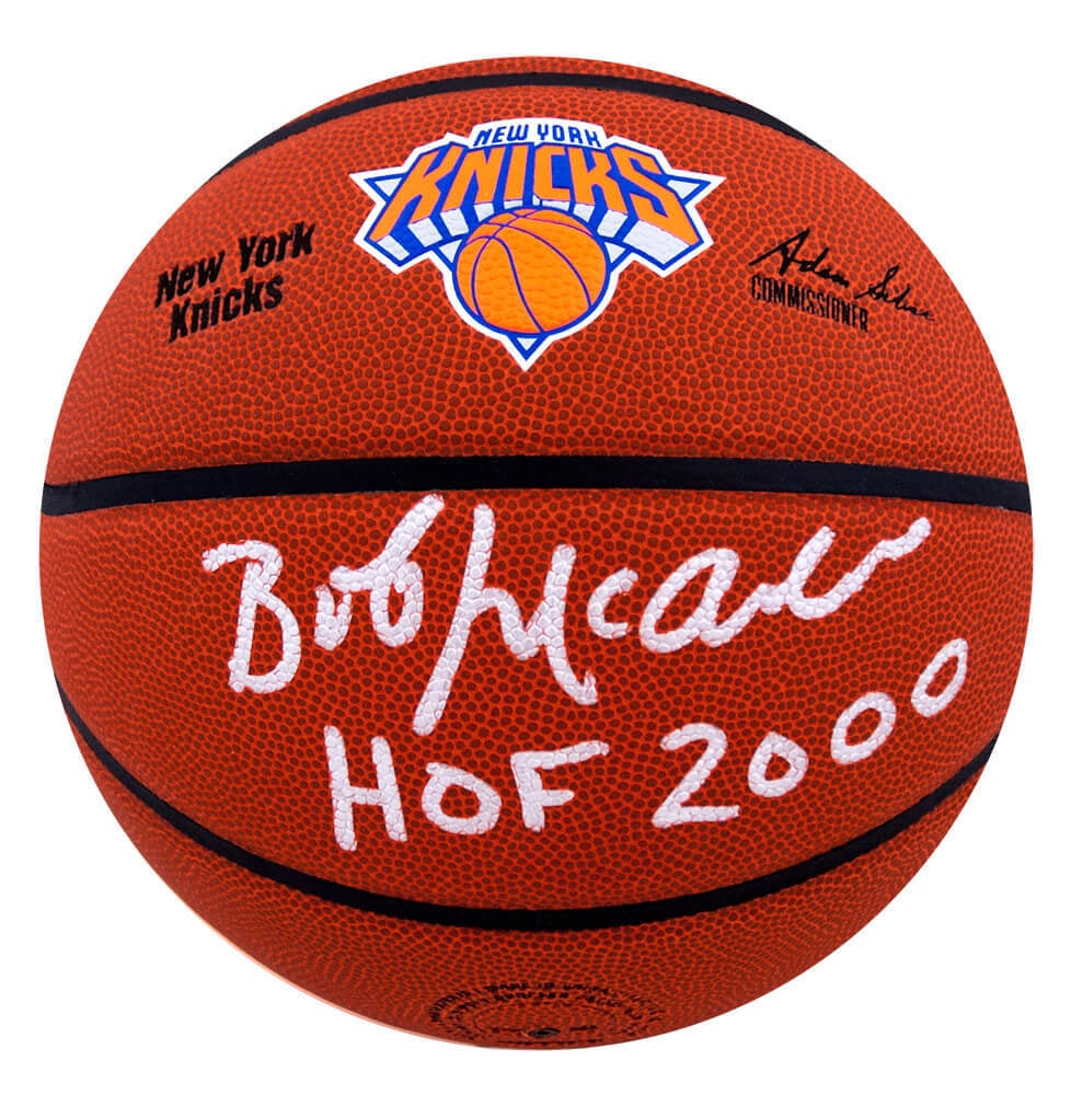 Bob McAdoo Signed Knicks Logo Basketball with HOF 2000 Inscription: Bob McAdoo Signed Knicks Logo Basketball with HOF 2000 Inscription This is a Bob McAdoo signed New York Knicks logo Wilson NBA basketball featuring the inscription 'HOF 2000'. The ball is an original