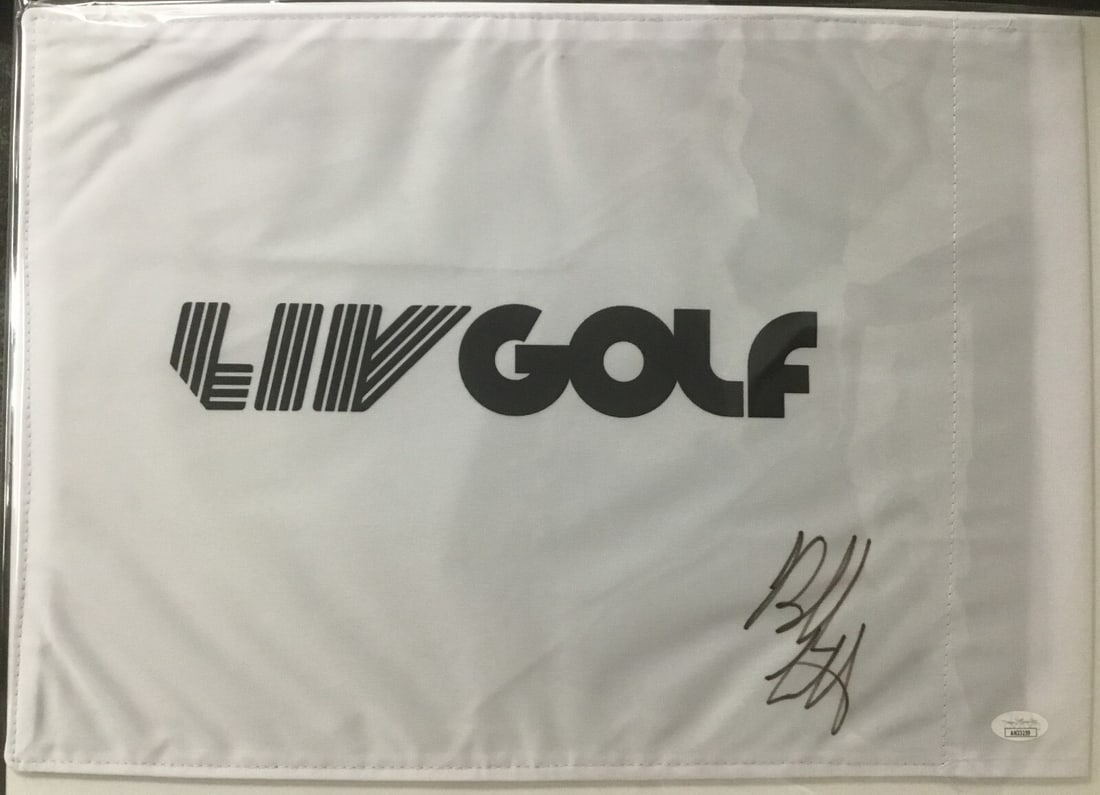 Bubba Watson Autographed LIV Golf Pin Flag JSA AK33259: Bubba Watson Autographed LIV Golf Pin Flag JSA AK33259 This is an official LIV Golf pin flag signed by the renowned golfer Bubba Watson. The flag, authenticated by James Spence Authentication (JSA) wi